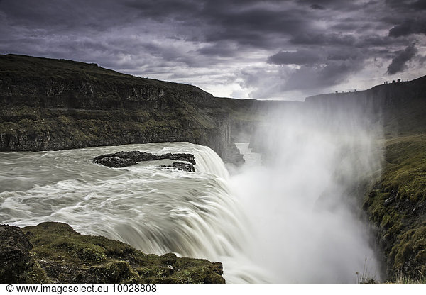 Waterfall among cliffs  Gulfoss  Iceland