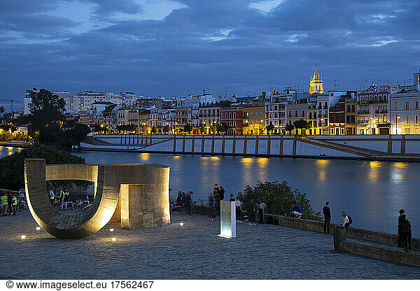 Waterfront view of Seville at night  along the Rio Guadalquivir  Seville  Andalucia  Spain  Europe