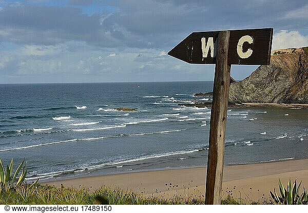 WC sign at Amoreira beach  beach with cliffs and sandy beach  Amoreira  Aljezur  Iberian Peninsula  Portugal  Europe