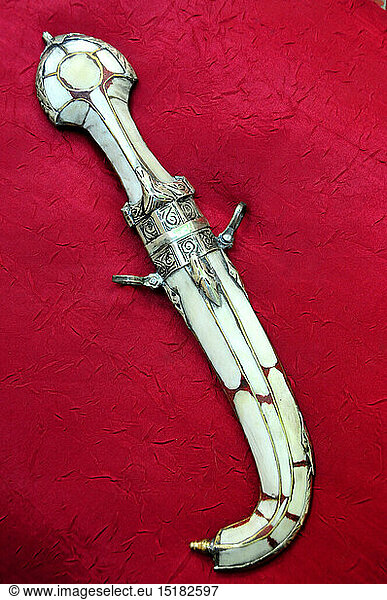 weapons  typical curved dagger in a souvenir shop at the Place Djemma el-Fna  Marrakech  Morocco  detail  details  souvenir  souvenirs  Moroccan  East  Orient  thrusting  thrustings  hand weapon  hand weapons  embellish  embellishing  decorative  weapons  arms  weapon  arm  curved dagger  curved daggers  souvenir shop  souvenir store  souvenir shops  souvenir stores  Marrakech  Marrakesh  historic  historical