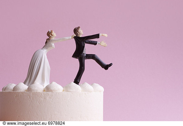Wedding Cake Figurines  Bride Grabbing Runaway Groom