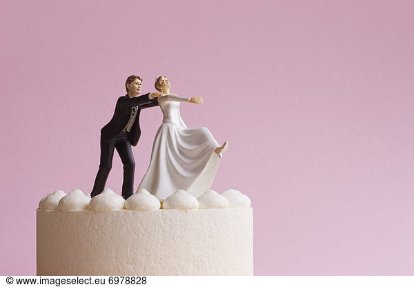 Wedding Cake Figurines  Groom Grabbing Runaway Bride
