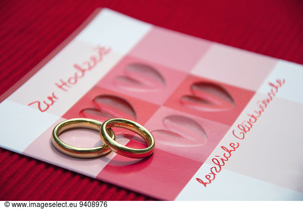 Wedding rings on wedding card  close up