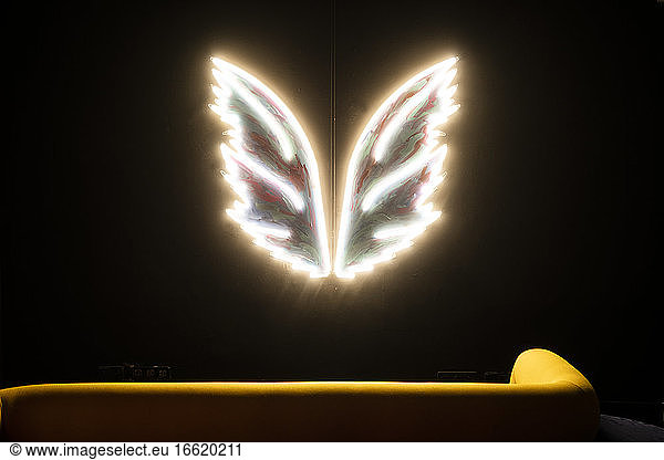 White glowing neon wings
