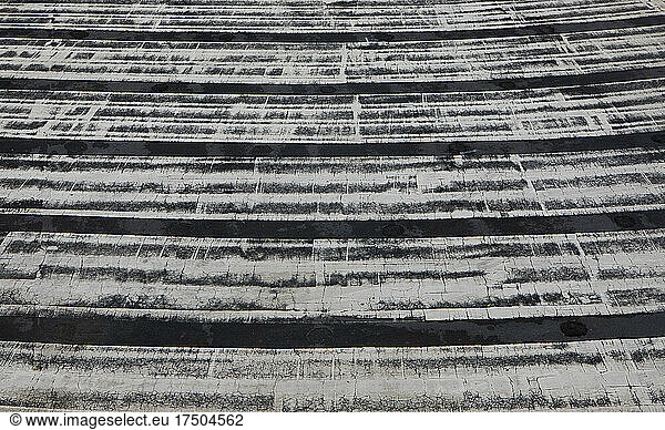 White weathered stripes on parking area pavement