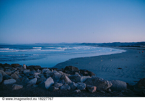 Wide angle of Morro Bay Beach at blue hour.