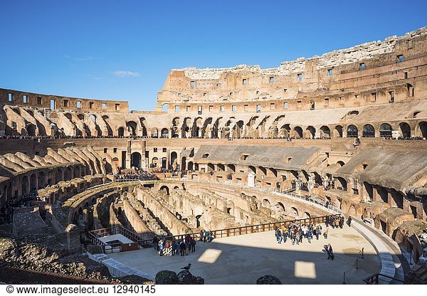 Wide panoramic view of the Colosseum or Coliseum  also known as the Flavian Amphitheatre  with the below ground level hypogeum  Rome. Lazio. Italy.