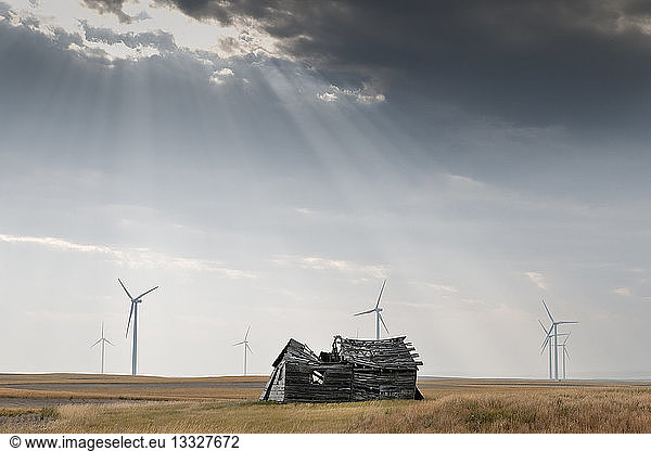Wind and farm in ruins Montana USA