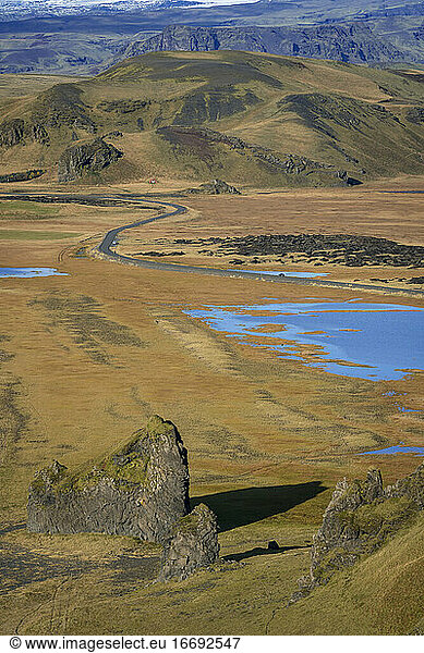 Winding road leading through mountainous landscape  South Iceland  Iceland