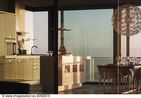 Windows surrounding modern kitchen