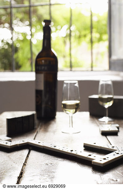 Wine and Dominoes on Table