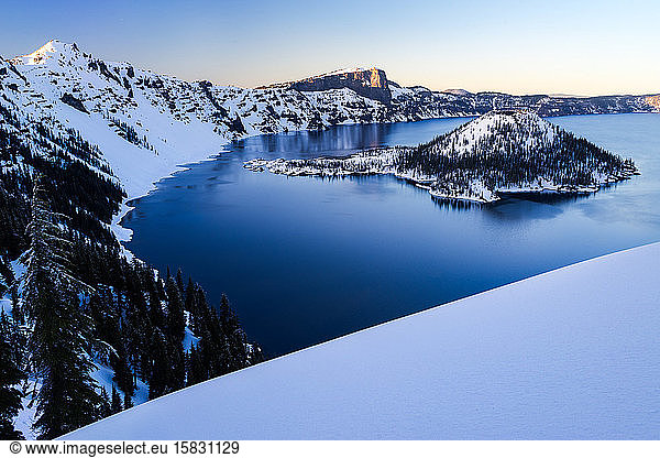 Winter at Crater lake and wizard island during sunset