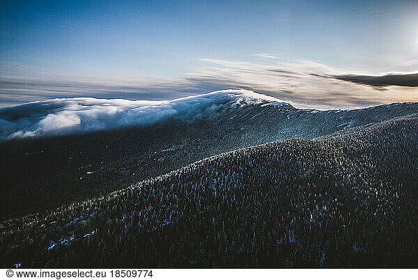 Winter clouds sit on Saddleback Mountain  Maine near Appalachian Trail