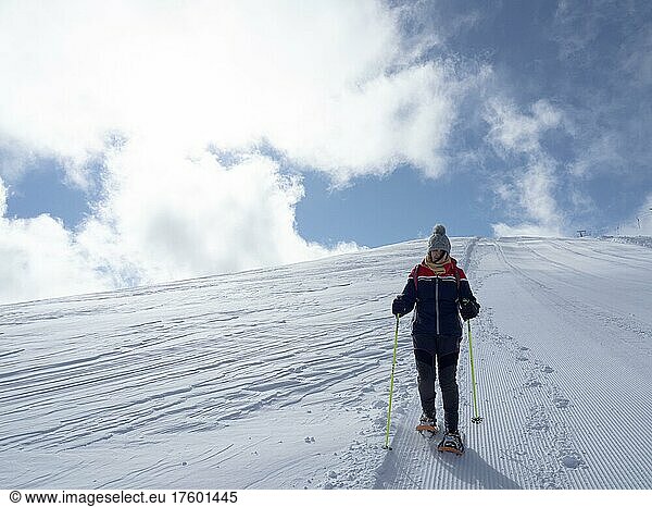 Winter landscape  snowshoe hiker on her way to the Lawinenstein  Tauplitzalm  Styria  Austria  Europe