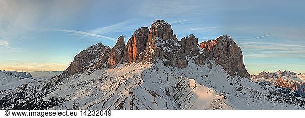 Winter overview at sunset  Sassolungo (German Langkofelgruppe) located between the Val Gardena and Val di Fassa  Dolomites  Trentino-Alto Adige  Italy