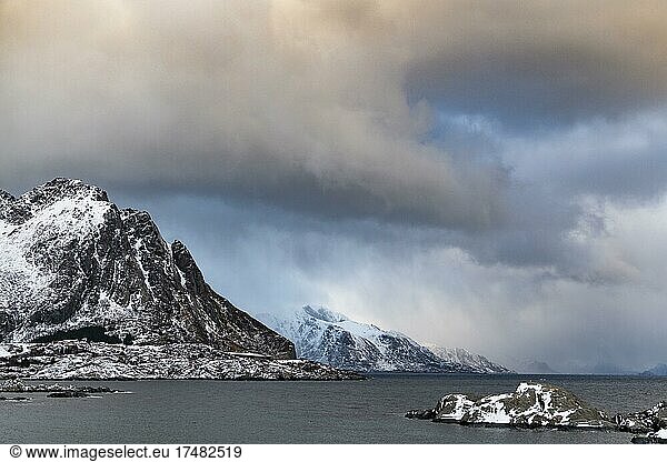 Winter Scandinavian landscape  storm  sea  mountains  snow  Hamnøy  Nordland  Lofoten  Norway  Europe