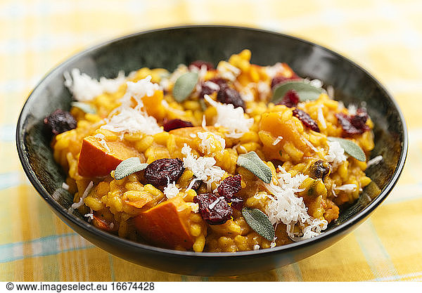 Winter squash risotto with dried cranberries  sage and vegan cheese