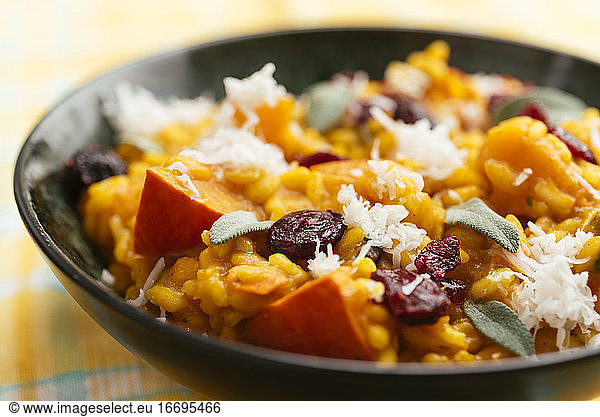 Winter squash risotto with dried cranberries  sage and vegan cheese