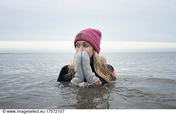 woman breathing whilst cold water swimming in the ocean