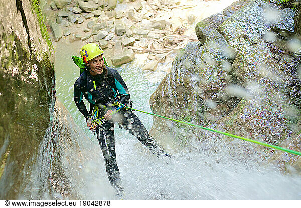 Woman canyoneering in Furco Canyon in Spanish Pyrenees