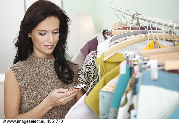 woman checking price tag