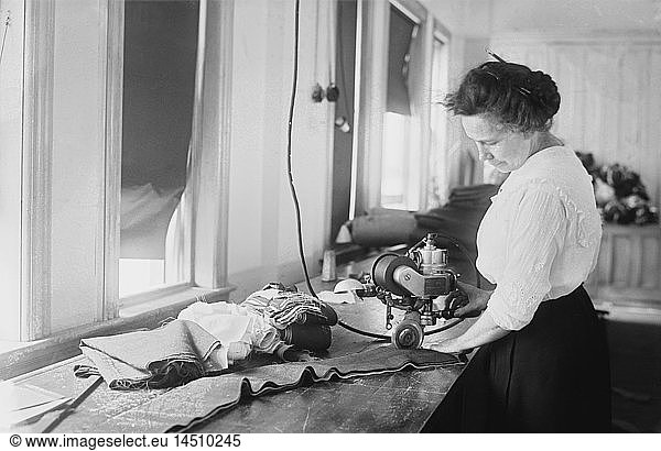 Woman Cutting Flag Stripes for American Flags  Brooklyn Navy Yard  Brooklyn  New York  USA  Bain News Service  July 1917