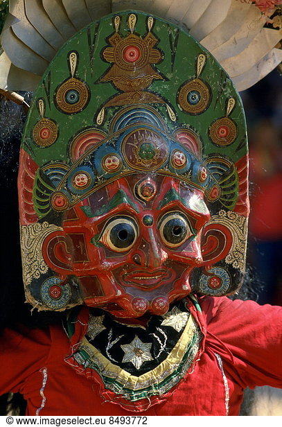 Woman dancer in painted mask Bhaktapur  Nepal
