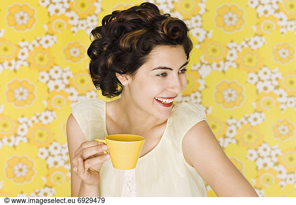 Woman Drinking from Mug
