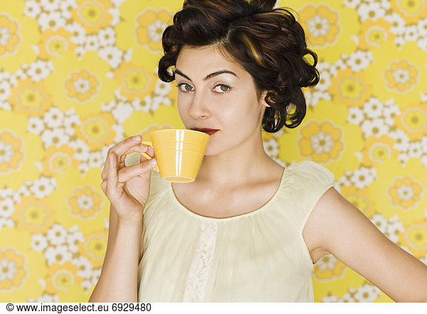 Woman Drinking from Mug