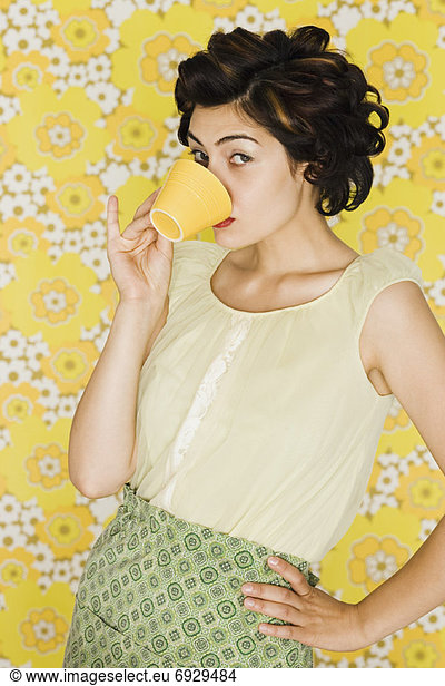 Woman Drinking from Mug