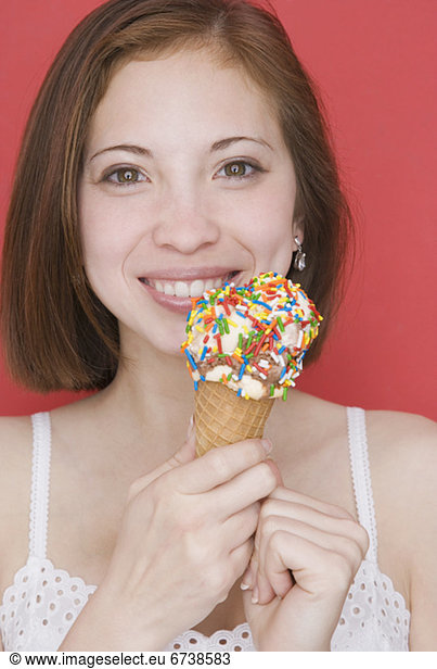 Woman eating ice cream cone