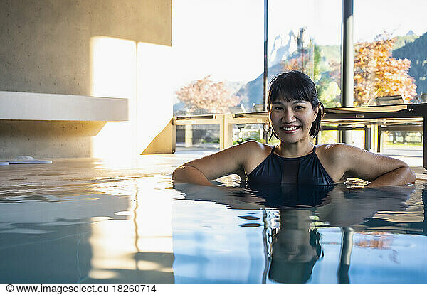 woman enjoying a thermal spa bath in the Dolomites