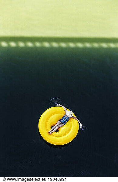 Woman floating down a river
