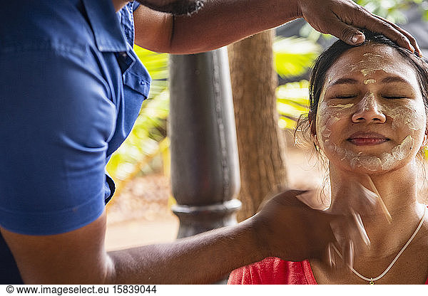 woman getting a Ayurveda facial treatment in Sri Lanka