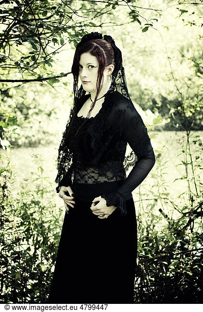 Woman  Gothic  redhead  retro  standing  serious