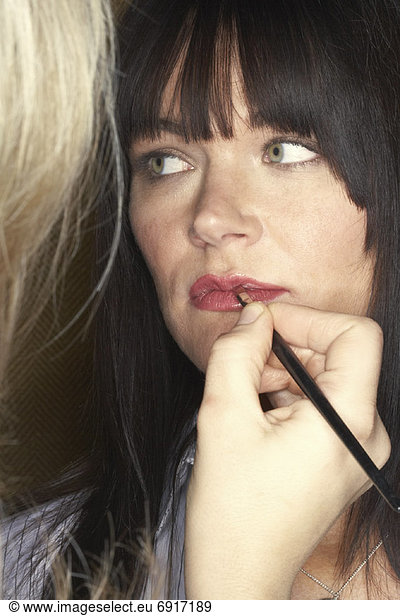 Woman Having Make-Up Applied