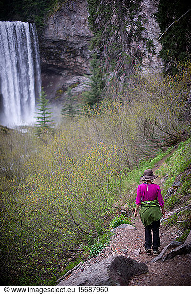 woman  hiker  hiking  path  waterfall