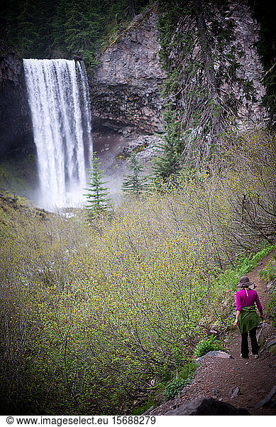 woman  hiker  hiking  path  waterfall