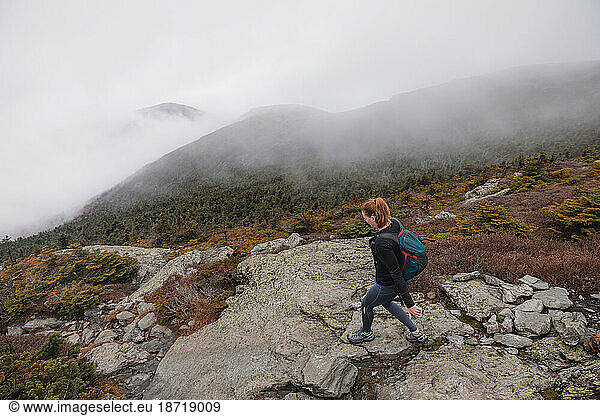 Woman hiking on trail