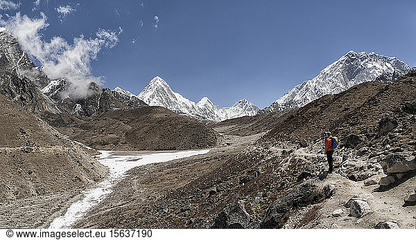Woman in front of Pumori Mountain  Himalayas  Solo Khumbu  Nepal