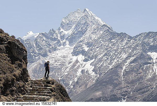 Woman in front of Thamersku mountain  Himalayas  Solo Khumbu  Nepal