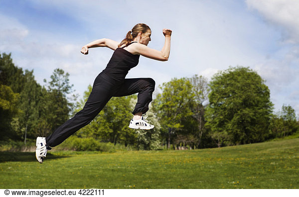 Woman in middle of jump
