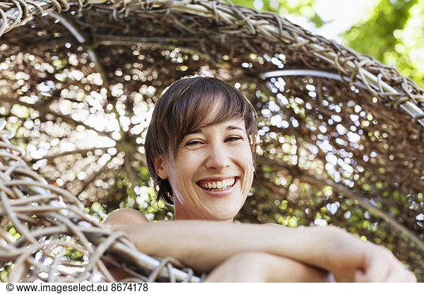 Woman laughing in tree house