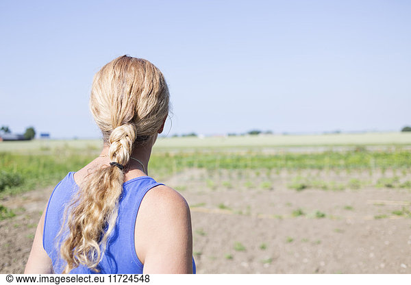 Woman looking at field