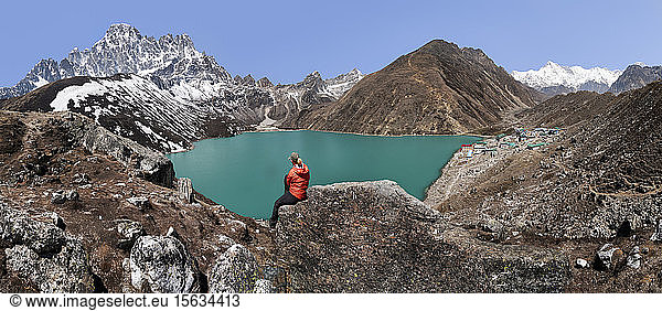 Woman looking at Goykyo Lake  Himalayas  Solo Khumbu  Nepal