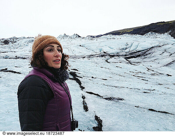 Woman looking out over Solheimajokull Glacier Iceland