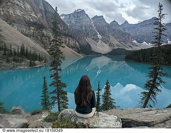 Woman looking over Moraine Lake