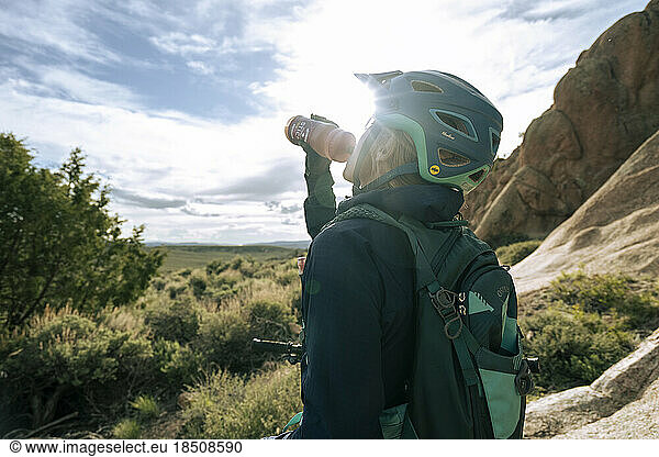 Woman mountain biking in the high desert in Colorado