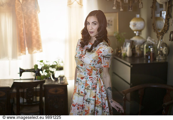 Woman posing in floral dress