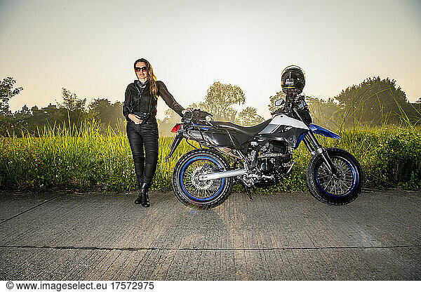 woman posing with her motorbike in the North of Thailand